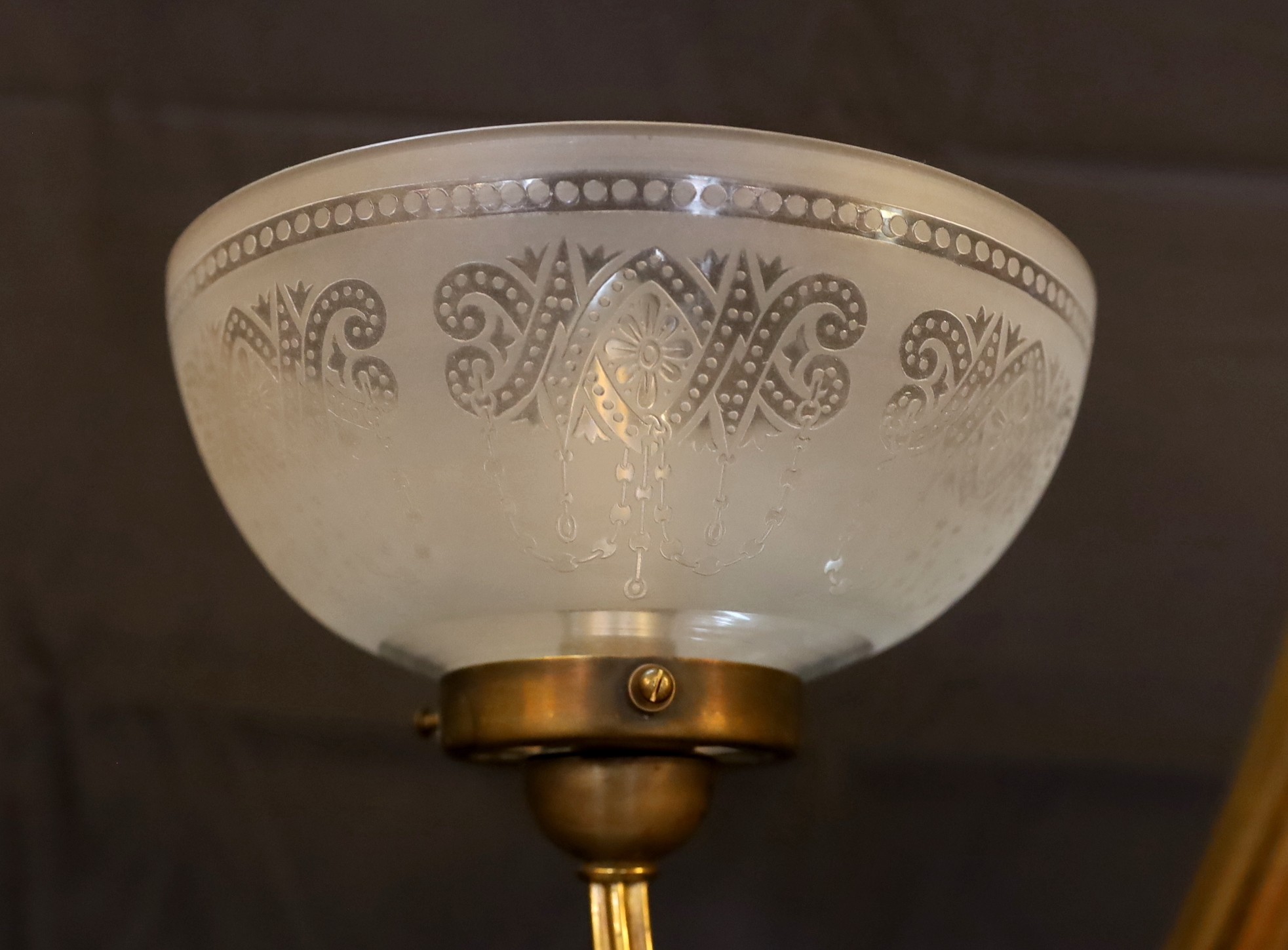 A mid 19th century brass twin branch gasolier with etched crystal glass shades, drop 100cm. width 90cm